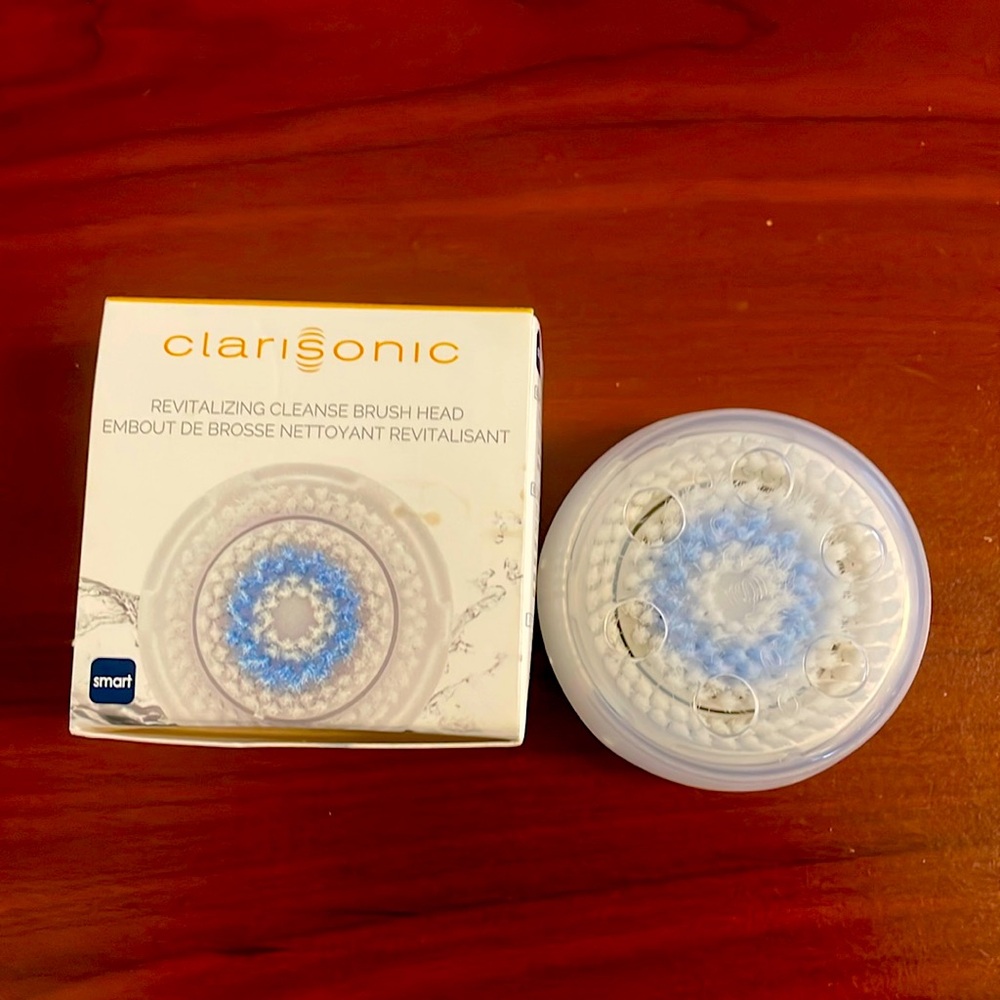 revitalizing, cleanse brush head, not sealed, but never been used, brand new.